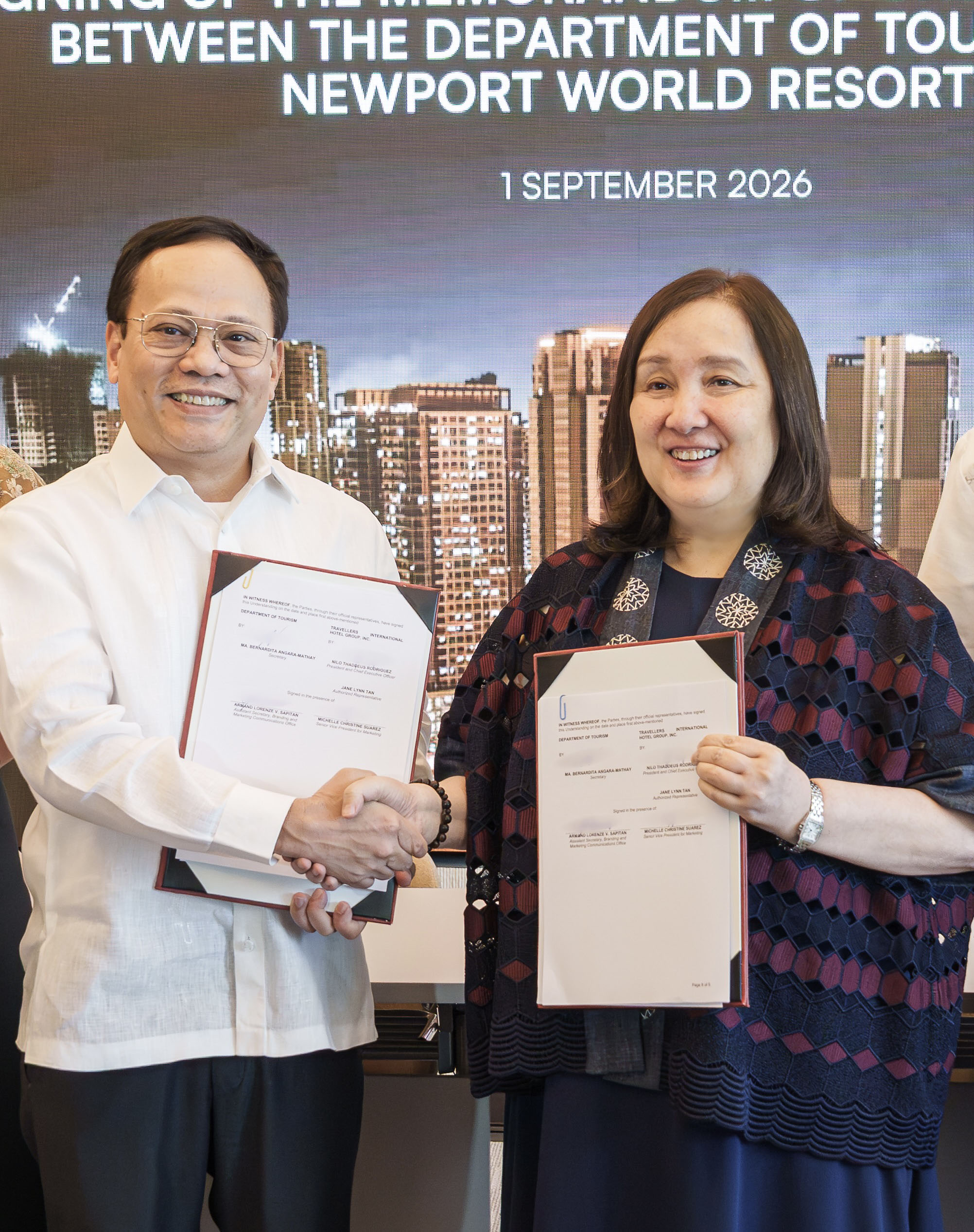 Newport World Resorts President and CEO Nilo Thaddeus Rodriguez and Tourism Secretary Dita Angara-Mathay exchanged a handshake after the signing.