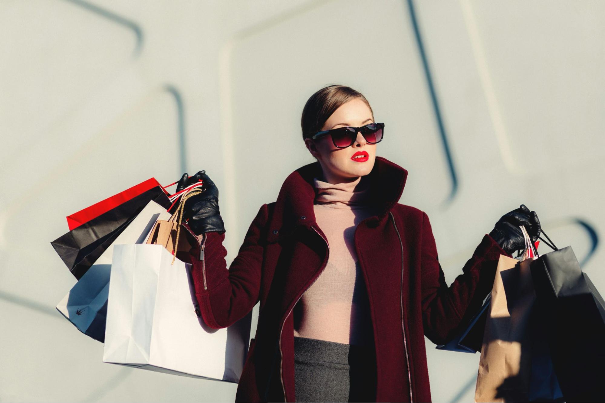 A woman holding shopping bags