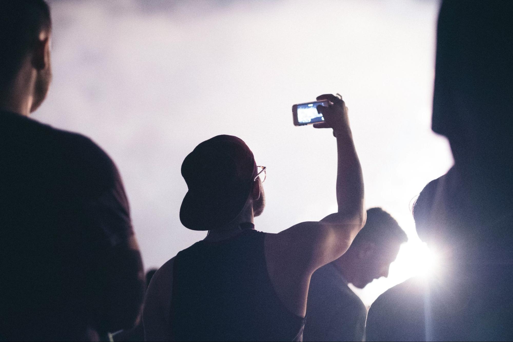 A man recording using his phone