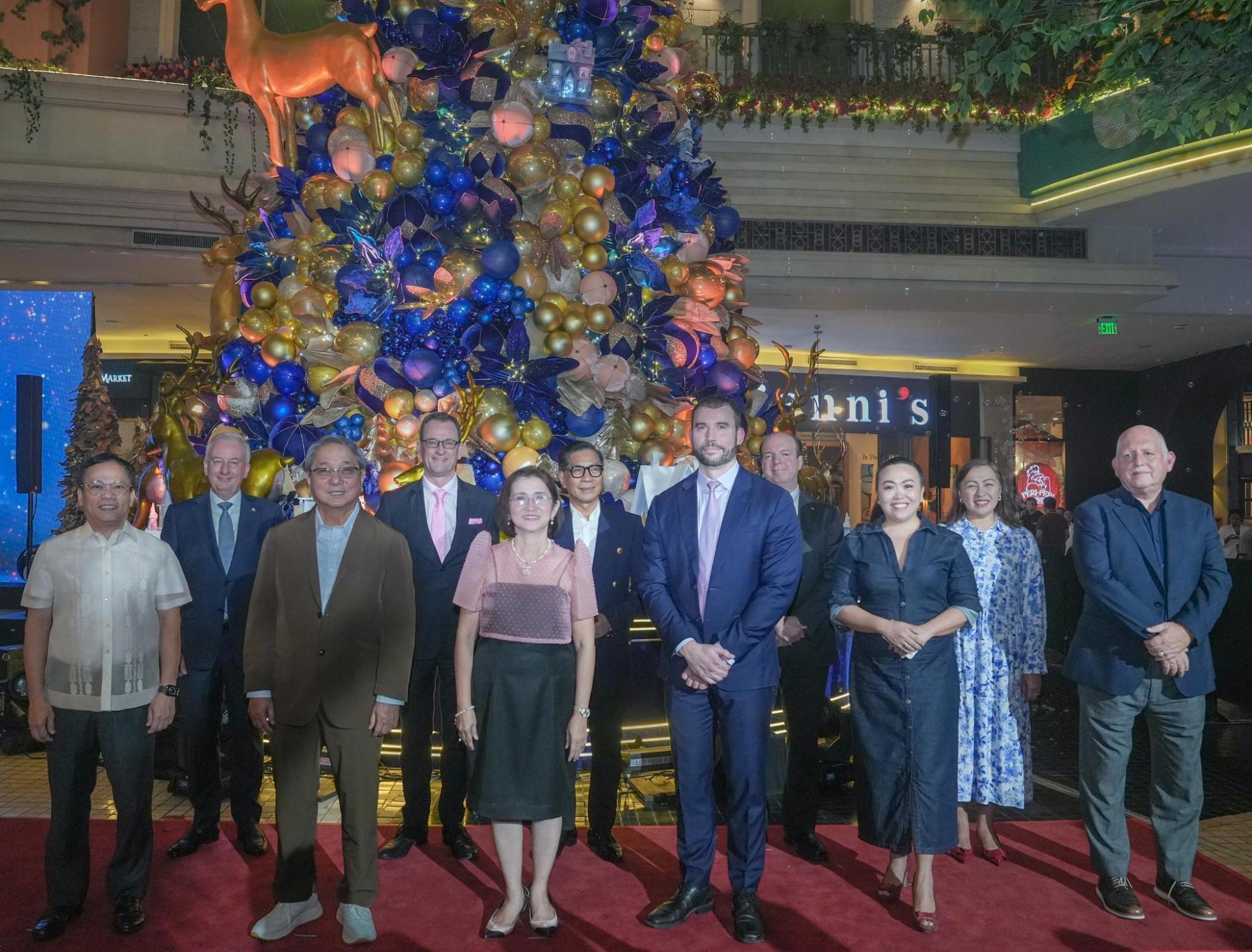 Newport World Resorts executives kicked off the holiday season with the annual tree lighting ceremony for The World of Christmas property-wide celebrations with (foreground, L-R) Newport World Resorts President and CEO Nilo Thaddeus Rodriguez, Pasay City Representative Hon. Congressman Antonino Calixto, Pasay City Mayor Hon. Imelda “Emi” Calixto-Rubiano, and Newport World Resorts Chief Operating Officer Lance Gautreaux. Joining them are (background, L-R) Multi-Property Vice President for the Philippines and Marriott Hotel Manila General Manager Bruce Winton, Hilton Manila General Manager John Lucas, Holiday Inn Express Manila - Newport City General Manager Elpidio Beloso Jr., Hotel Okura Manila General Manager Jan Marshall, Sheraton Manila Hotel General Manager Anna Vergara, Newport Mansion Resident Manager Cynnia Chi, and Megaworld Lifestyle Malls First Vice President and Head Graham Coates. 